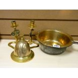 Iron handled brass pan, pair of serpent brass candleholders and a brass tabletop bell