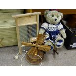 Washboard, model windmill and a Millennium 2000 Collection teddy bear on a rocking chair