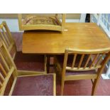 Twin flap gate leg table by Timeless Trend Furniture and four Ercol? light wood chairs
