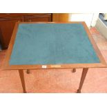 Modern foldover baize lined card table on tapered supports