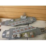 Two model aircraft carriers