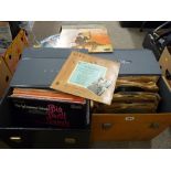 Four LP cases with vinyl contents and a box of LP records