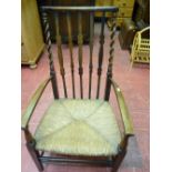 Polished wood rush seated elbow chair