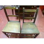 Two non-matching farmhouse chairs