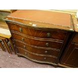 Serpentine front four drawer chest with inlay
