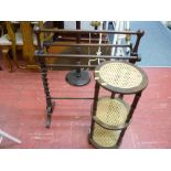 Dark wood towel airer and a circular cane three shelf whatnot