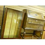 Two drawer writing bureau and a single door display cabinet
