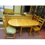 Twin flap gate leg pine dining table with four chairs