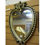 Gilt framed heart shaped mirror