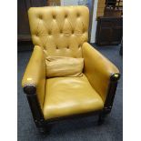 A William IV buttoned backed and studded library chair in mustard leather