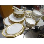 A quantity of Royal Tuscan fine bone china dinnerware for Harrods with Grecian key & gilded border