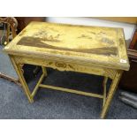 An antique chinoiserie decorated fold over card table with baize lined interior decorated with