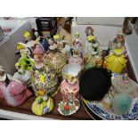 A collection of pottery figures, two display plates ETC Condition Report: please request* *Condition