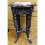Chinese carved hardwood jardiniere plant stand with inset marble top, 58.5cms high