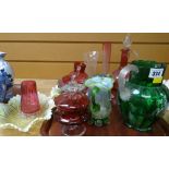 A quantity of mixed coloured antique glass including cranberry Condition Report: please request* *