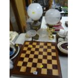 A modern painted soldier figure chess set together with two oil lamps ETC Condition Report: please