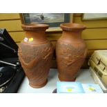 A pair of oversized relief decorated red-ware Oriental style vases Condition Report: please request*