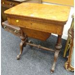 An antique walnut foldover sewing / games table with slide out basket-drawer and inlaid detail