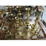 Sundry pairs of brass candlestick holders Condition Report: please request* *Condition is not stated