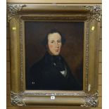 A nineteenth century oil on canvas head & shoulders portrait of a gentleman in a similar period