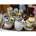 A good collection of jugs including three good copper lustre examples and relief decorated Parian