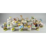 A collection of nineteen Beswick Beatrix Potter figures including good 'gold back-stamp' examples (