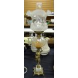 An antique brass & marble based figural oil lamp with etched clear glass reservoir, conforming