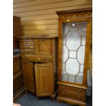 Reproduction mahogany finish astragal glazed display cabinet having two-drawer base Condition