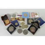 A quantity of mixed coinage including commemorative crowns, commemorative £2 & £1 coins, a dollar