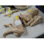 A Tom Greenshields marble resin sculpture of a reclining nude, 36cms long