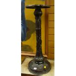 An antique Oriental bronze planter pedestal with lobed circular base, incise decorated to the