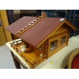 A doll's house in a form of an Alpine chalet with terrace Condition Report: please request* *