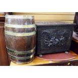 A good relief decorated metal coal box with twin handles & claw feet together with an oval barrel