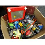 Box of vintage children's toys including Etch-A-Sketch, model cars & soldiers ETC Condition