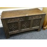 A good early nineteenth century carved oak blanket chest with primitive decoration & of small