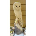 A wooden carved owl Condition Report: please request* *Condition is not stated in this type of