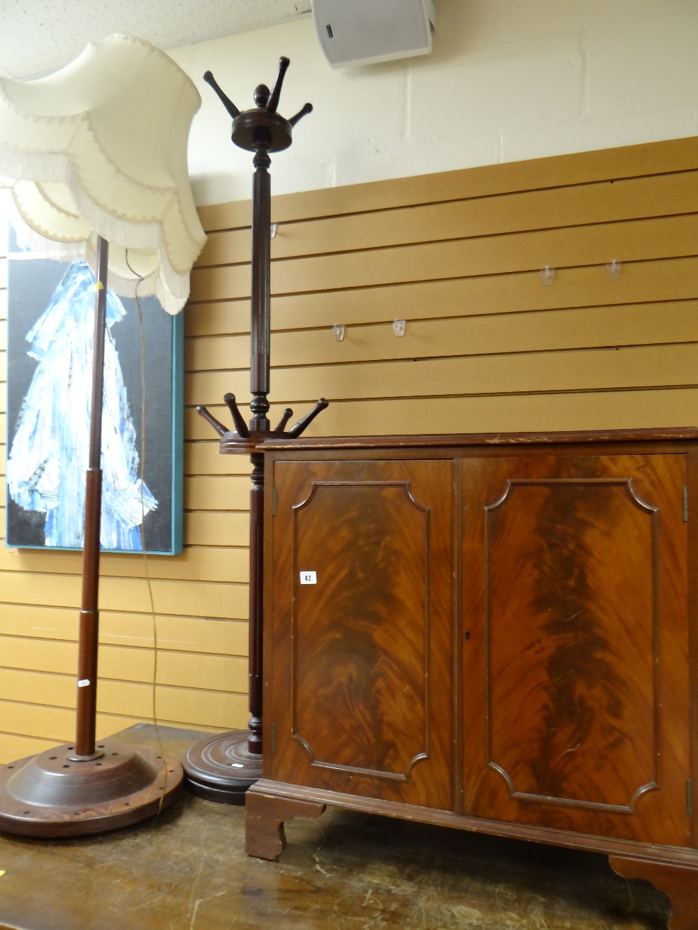 Twentieth century standard lamp on circular base together with mid-twentieth century coat stand &