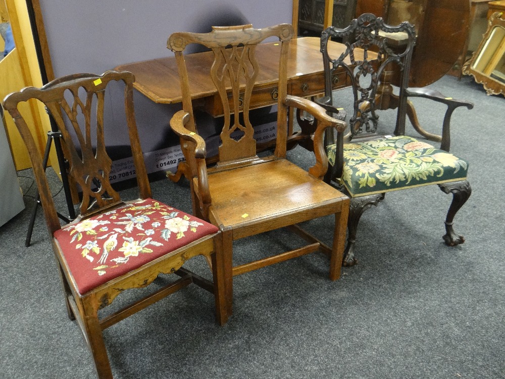 A good carved antique chair with tapestry cushion seat & ornate open work back together with an