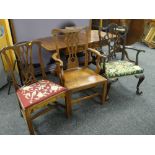 A good carved antique chair with tapestry cushion seat & ornate open work back together with an