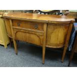 An antique inlaid mahogany breakfront sideboard composed of flanking cabinets & two centre