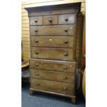 An antique oak & pine chest-on-chest on bracket feet with a base of three graduated drawers, the top