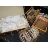 A vintage suitcase, a needlework footstool, quantity of vinyl singles ETC Condition Report: please