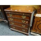 A reproduction chest of four graduated drawers & a pull out slide 73hx60wx38dcms. Condition