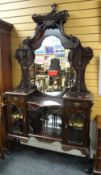 A fancy turn-of-the century mirror back cabinet sideboard, 229cms high. Condition Report: please