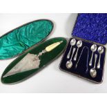 A cased set of six silver spoons & tongs together with a cased EPNS presentation trowel Condition