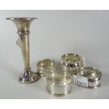 A silver trumpet vase & four silver napkin rings Condition Report: please request via email.