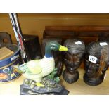 Four native African carved busts, a bargeware barrel with chess pieces as contents, letter rack