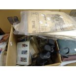 A quantity of cigarette cards, a vintage pair of binoculars in a case ETC Condition Report: please