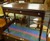 An antique foldover tea table on turned legs (A/F), 91wx45dx75hcms. Condition Report: please request