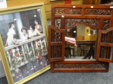 Hanging carved wooden mirror with central shutters revealing mirror together with coloured print